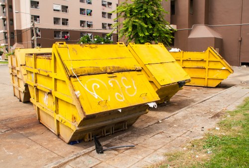 Demolition site in Soho with waste removal equipment