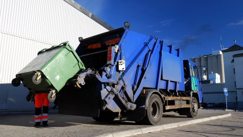Professional rubbish removal team in Soho collecting waste