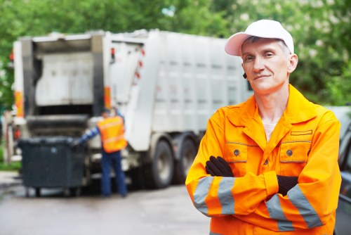 Happy customer interacting with skip hire service in Soho